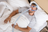 Man using a CPAP machine while sleeping in bed